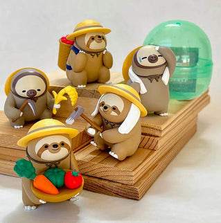 Farmer Sloth Figurine